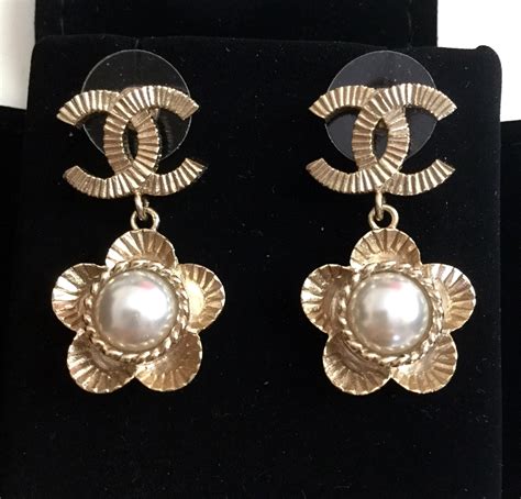 vintage gold chanel earrings|authentic chanel cc earrings.